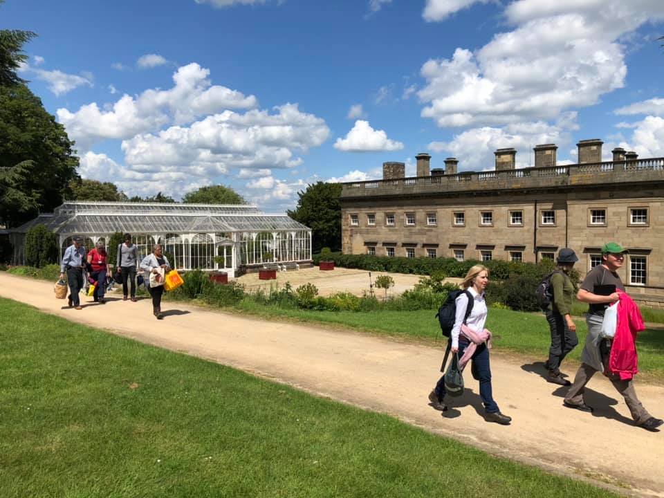 Students walking at the rear of the College