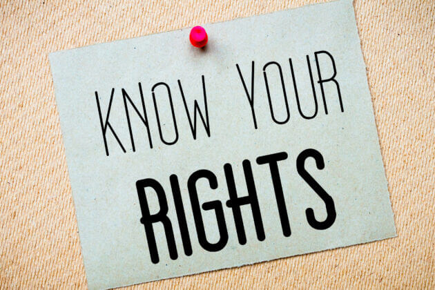 Know your rights sign pinned on background