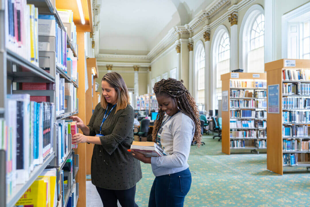 2 female students in Northern College Library