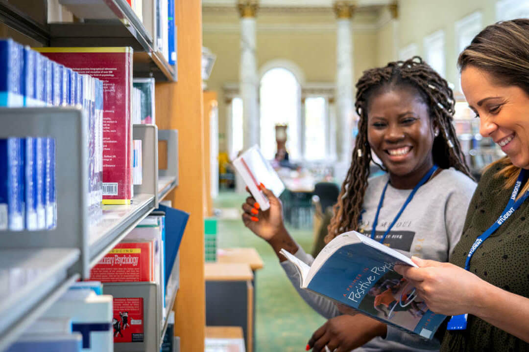 smiling students in library